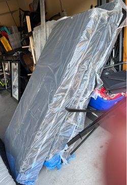 New 2 twin XL box springs in Plastic Wrap