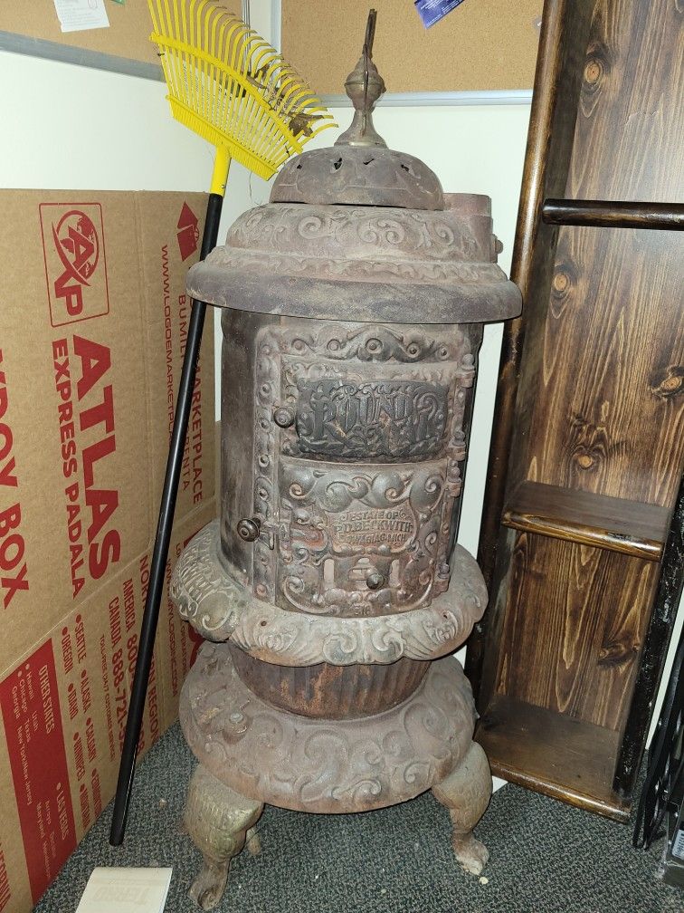 Antique Round Oak Stove (Estate Of P. D. Beckwith)