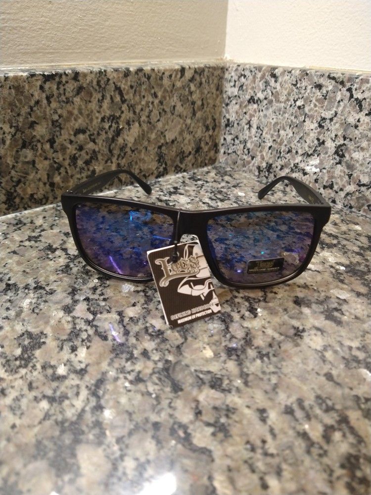 Locs Mirrored Lens Gangster Oversized Rectangular Horned Sunglasses. Brand new in original packaging.
Macho Men's authentic OG Locs gangster shades
