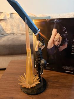 Final Fantasy rebirth tifa and cloud statuette