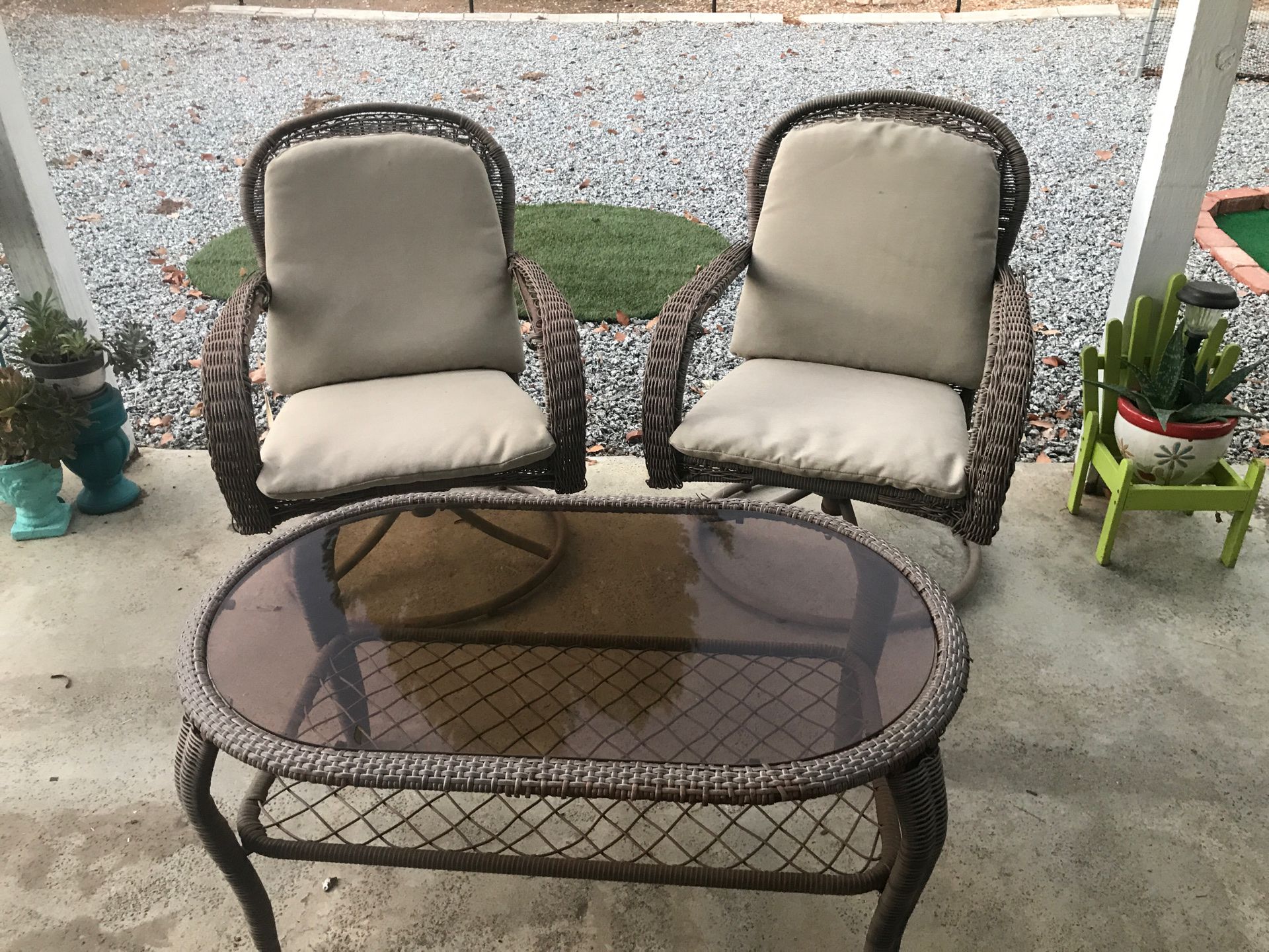 Outdoor furniture, 2 swivel chairs & glass table