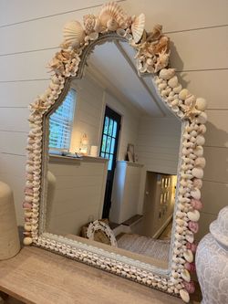 Costal shell mirror