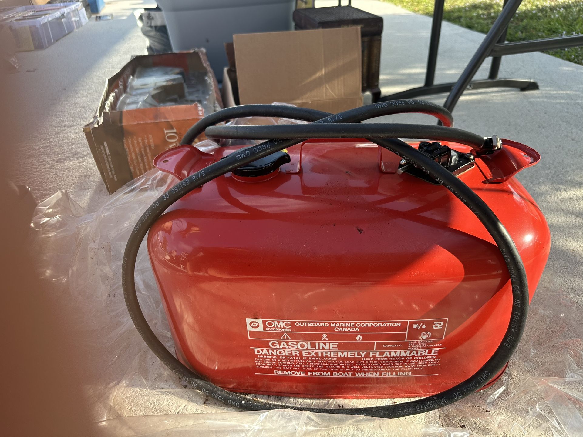 New Red OMC 6 Gallon Tank With Hose