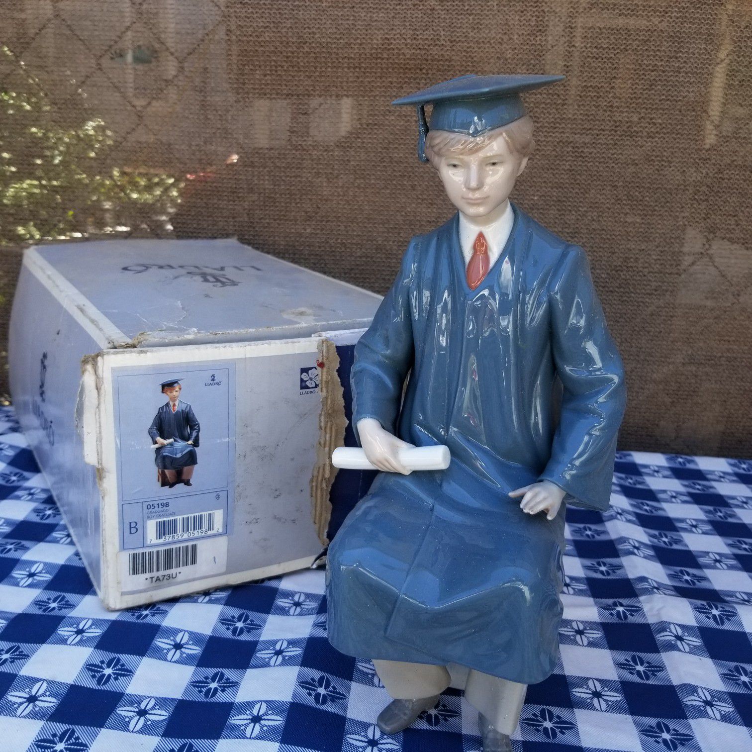Lladro porcelain figurine 'Boy Graduate'