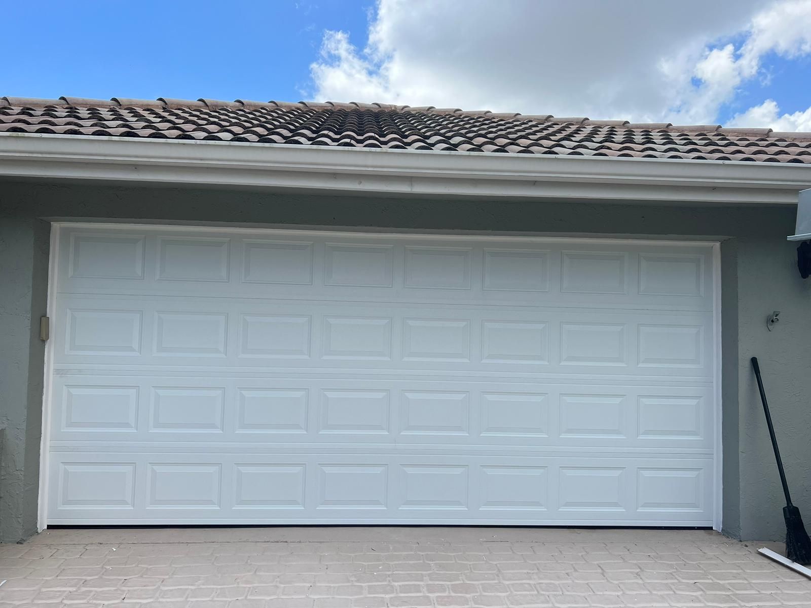 New White 2-Car Garage Door 16x7 – FREE Install & Hurricane Rated