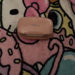 pinkish beige earbuds