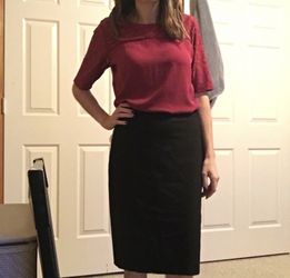 Ann Taylor black pencil skirt with flutter in back