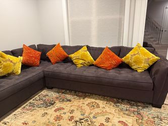 Calvin Heights 2 pc tufted Left arm Chase XL sectional with Ottoman’s
