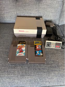 Complete Nintendo NES console with games