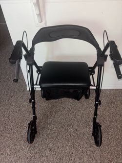 Walker with seat