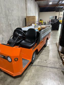 Orange Electric Utility Cart with Flatbed