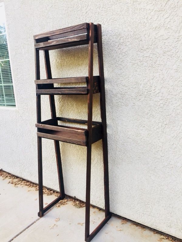 Farmers ladder I have 3 more that are not painted. I can paint them any color.