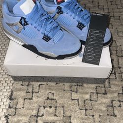 University Blue Jordan 4