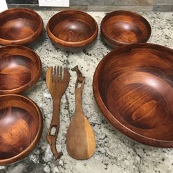 Eight piece cherry wood salad bowl set