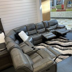 Going out of business sale. Madrid gray leather reclining sectional now $1599. Easy finance option. Same day delivery.