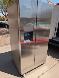 New Frigidaire fridge, stainless steel, dented