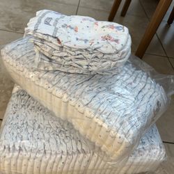 ~100 Size 3 Huggies Diapers