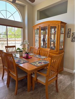 Dining table with extension, 6 chairs & China hutch