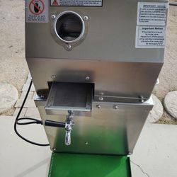 Electric sugarcane juice machine, 110v, with 4 wheels and high table, like new, $500.00. Peoria 