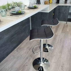 Elama 2 Piece Tufted Faux Leather Adjustable Bar Stool with Low Back in Black with Chrome Base