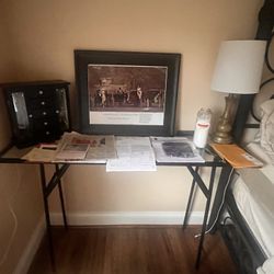 Small Glass And Metal Table Used As Small Writing Desk 