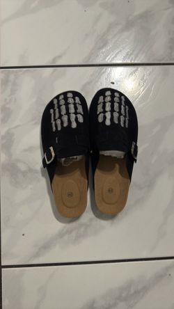 black skeleton clogs