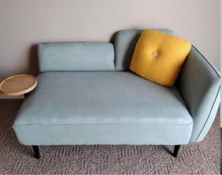 Loveseat attached coffee holder snd a cute yellow cushion