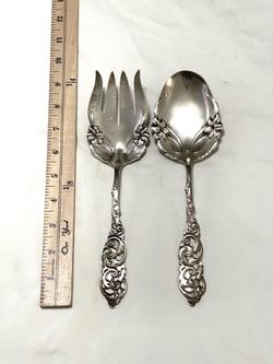 Great condition over 100 years old .925 silver serving flatware. Weighs total 200 grams