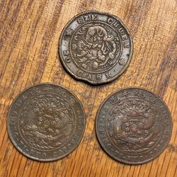 Three Chinese copper coins (see description)