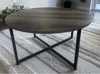 Round coffee table with metal legs