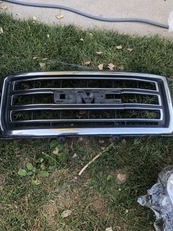 2015 GMC 1500 OEM headlights and grill