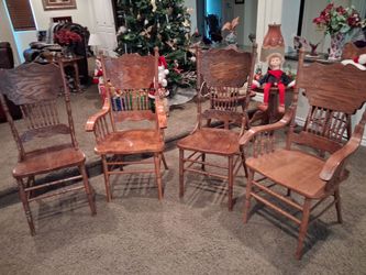 Oak chairs , two captain chairs , two regular chairs , perfect , very heavy