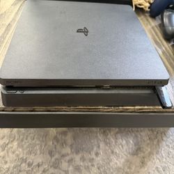 Sony PlayStation 4 slim console bundle including 4 controllers and 12 games