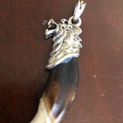 Wolf tooth pendant