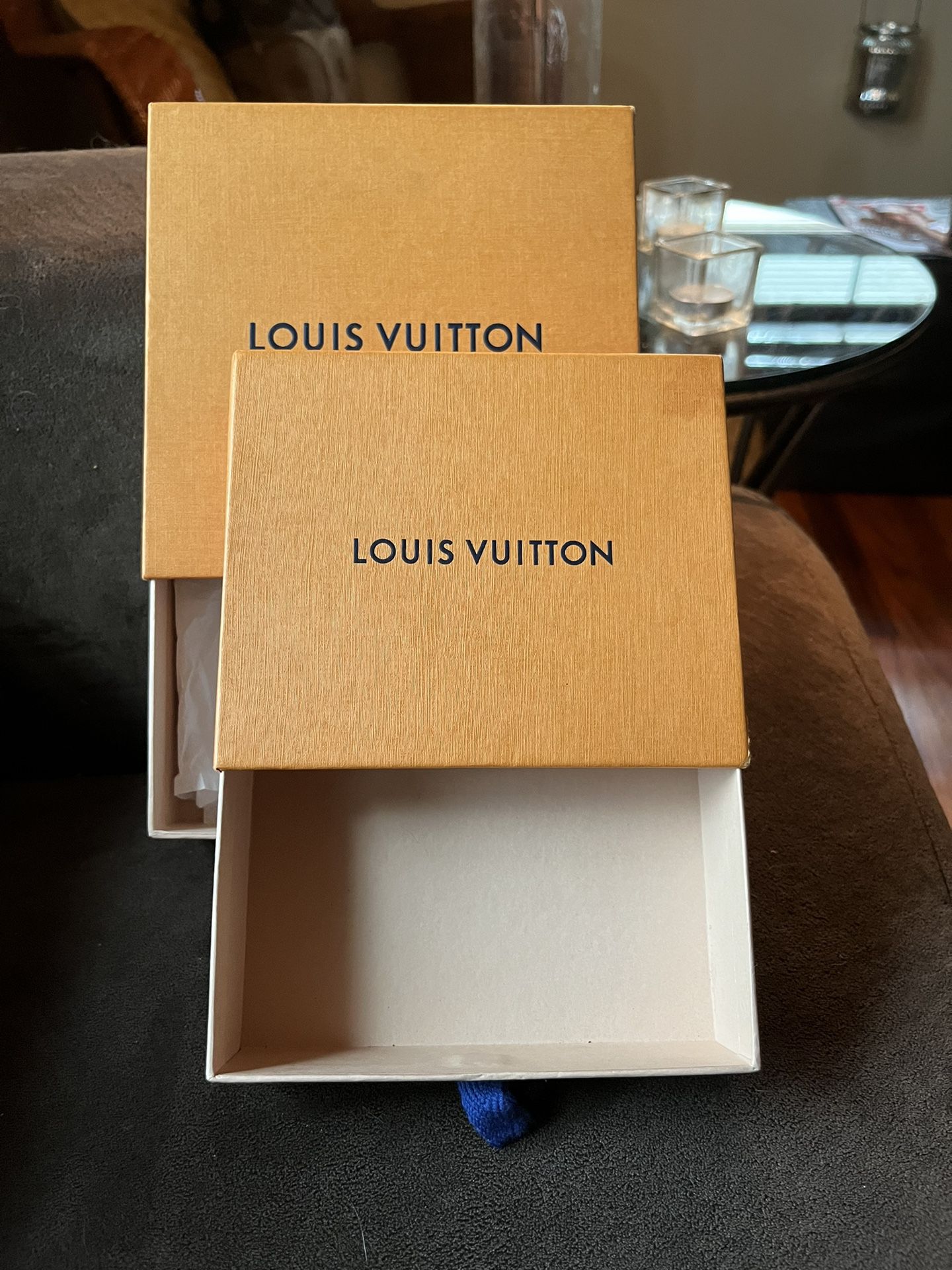 LV BOXES. ONE IS SLIGHTLY BIGGER THAN THE OTHER. 