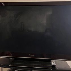 Panasonic 55" 3D TV with remote control and two 3D glasses