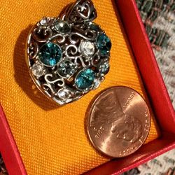 Heart locket pendant with blue & white crystals