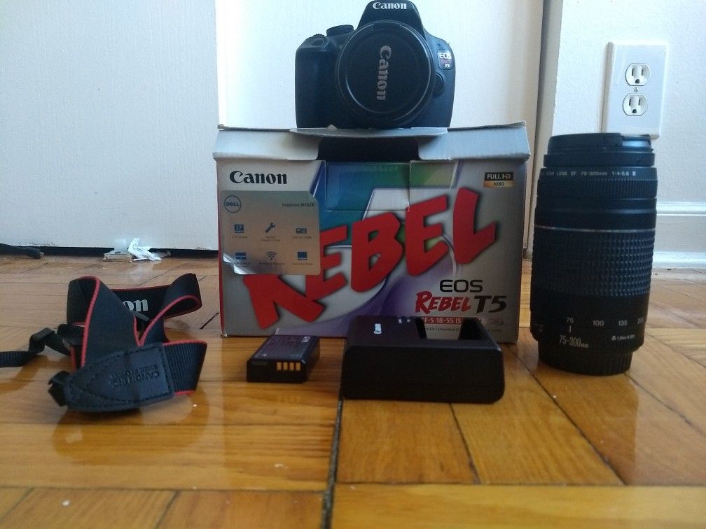 Canon Rebel T5 with 70-300 a d 18-55 lens