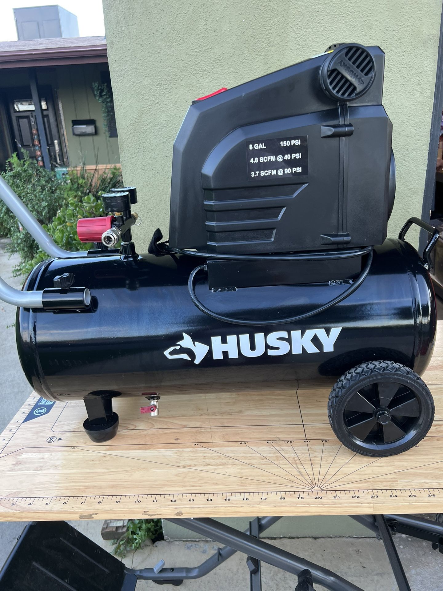 Husky 8 Gal. 150 PSI Portable Electric Oil-Free Horizontal Hotdog Air Compressor with Rubber Wheels and 1-Quick Coupler