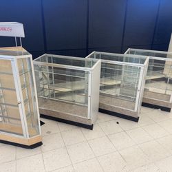 GLASS LOCK UP CABINETS