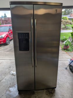 GE Profile Stainless Steel Side by Side Refrigerator with Ice maker and dispenser