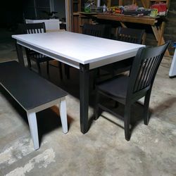 Table  with bench and 3 chairs