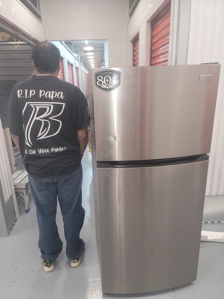 REFRIGERATOR,,, LESS THAN 1 YEAR OLD