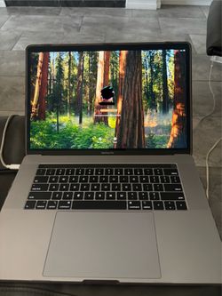 Apple MacBook Pro 15" 2019 Silver 1TB 2.3GHz Core i9 16GB - Touch Bar