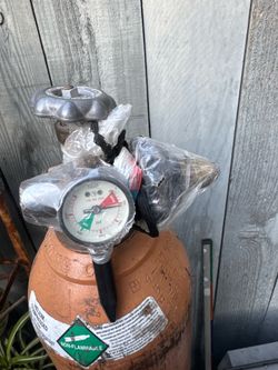 Helium tank with regulator