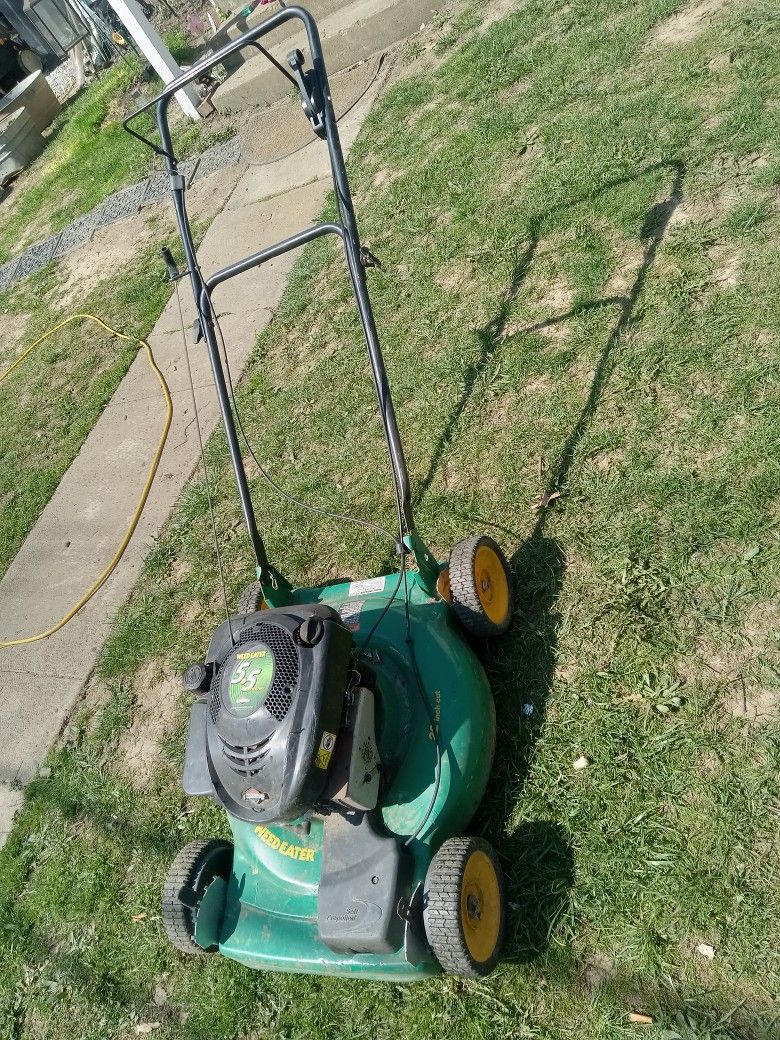 Lawn mower runs good self propelled weed eater that's the name of it weed eater