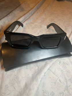 YSL sunnies with case