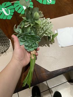 Green succulents, artificial centerpiece flowers