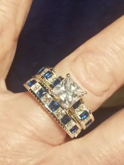 Beautiful 925 silver stamped wedding set with blue sapphires and white topaz. Size 7