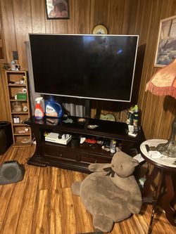Lg 55 inch tv with entertainment center and lg sound bar and sub woofer